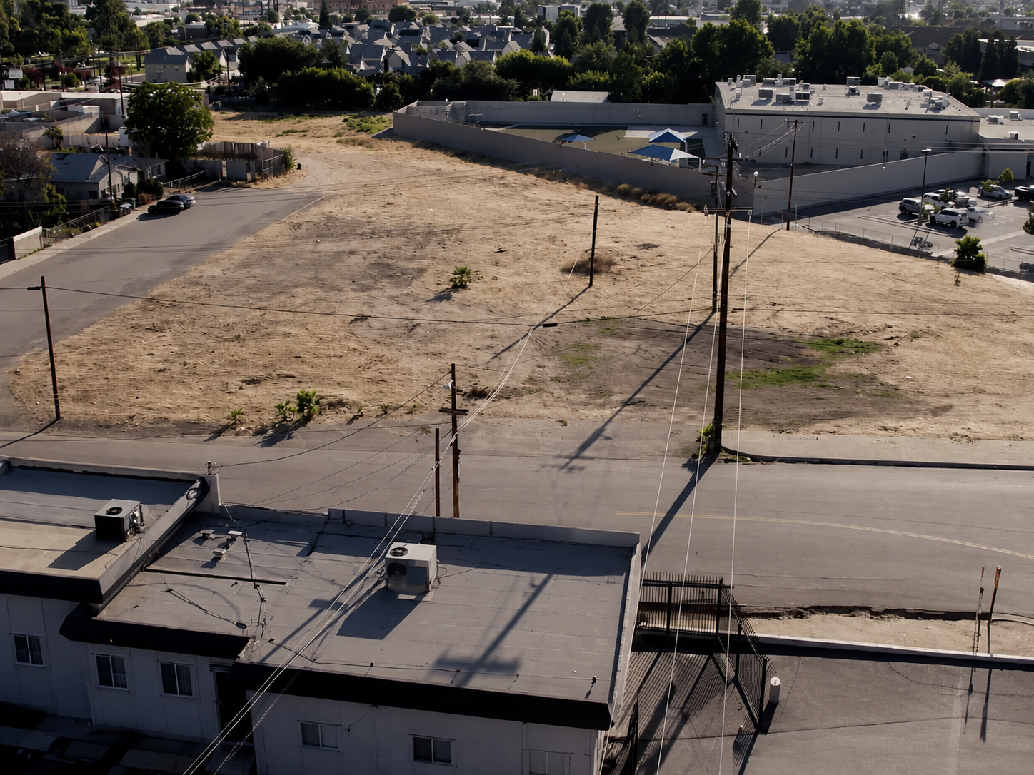 A rundown motel exterior along a highway