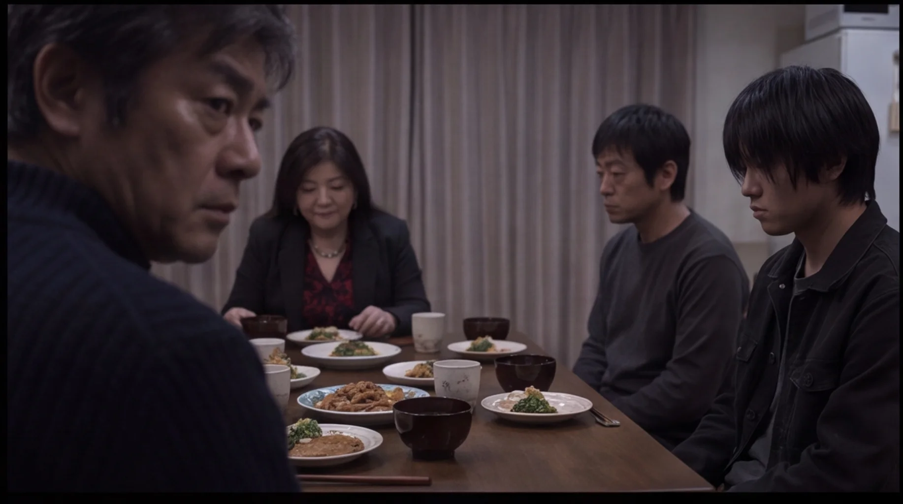A tense family dinner around a table