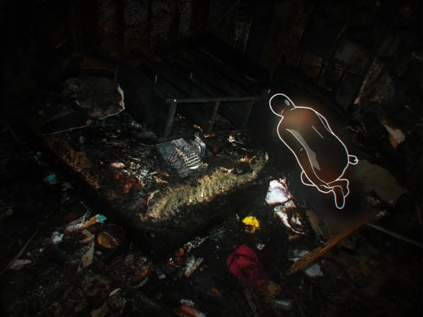 A burned-out room with an outline marking where a kneeling body was found