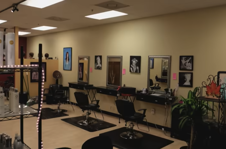 Investigators reviewing hair salon security footage and receipts
